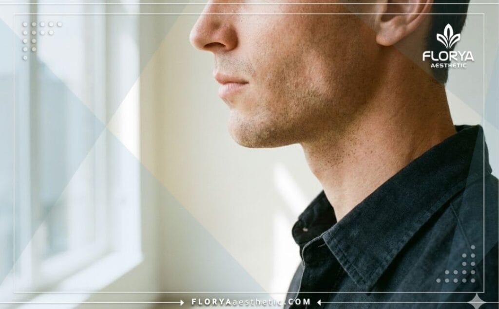 Close-up of a sharp masculine jawline showing the perfect result of male plastic surgery.