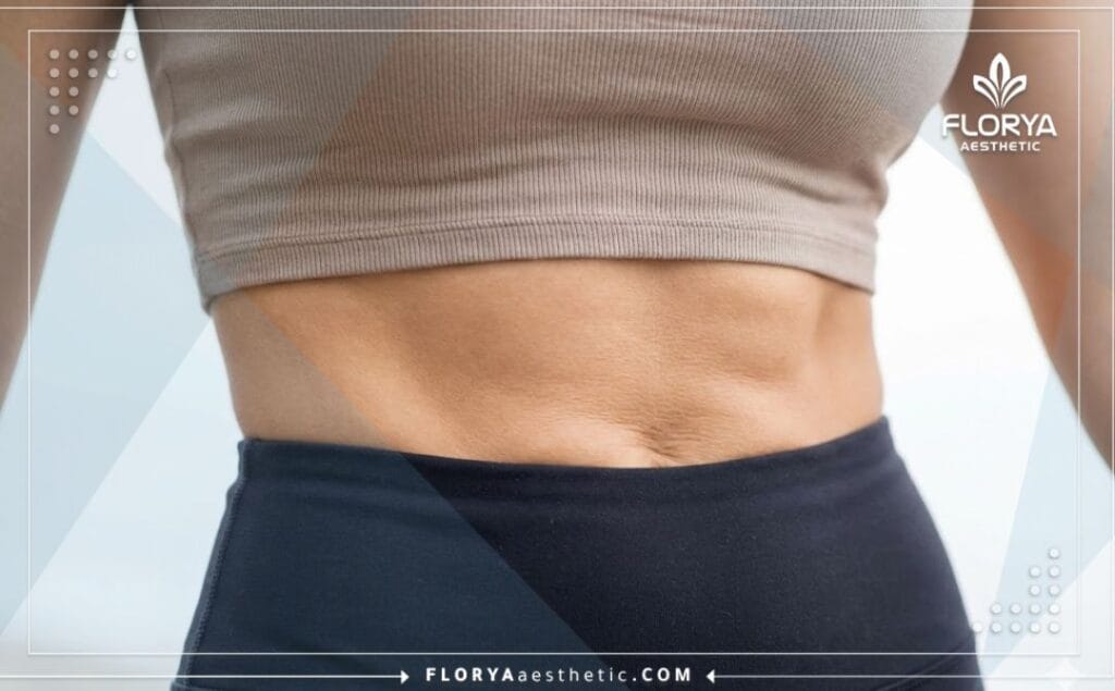 Primer plano cinematográfico de una cintura perfectamente esculpida tras la cirugía